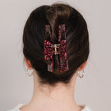 Pince à cheveux Lunette